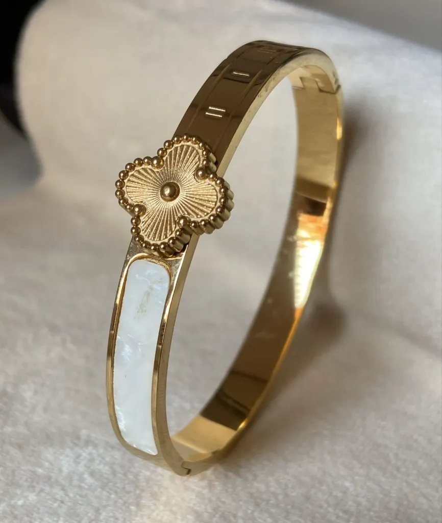 Van Cleef gold and white bangle bracelet