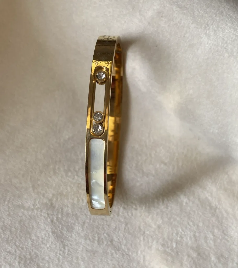 Movable diamond bangle bracelet