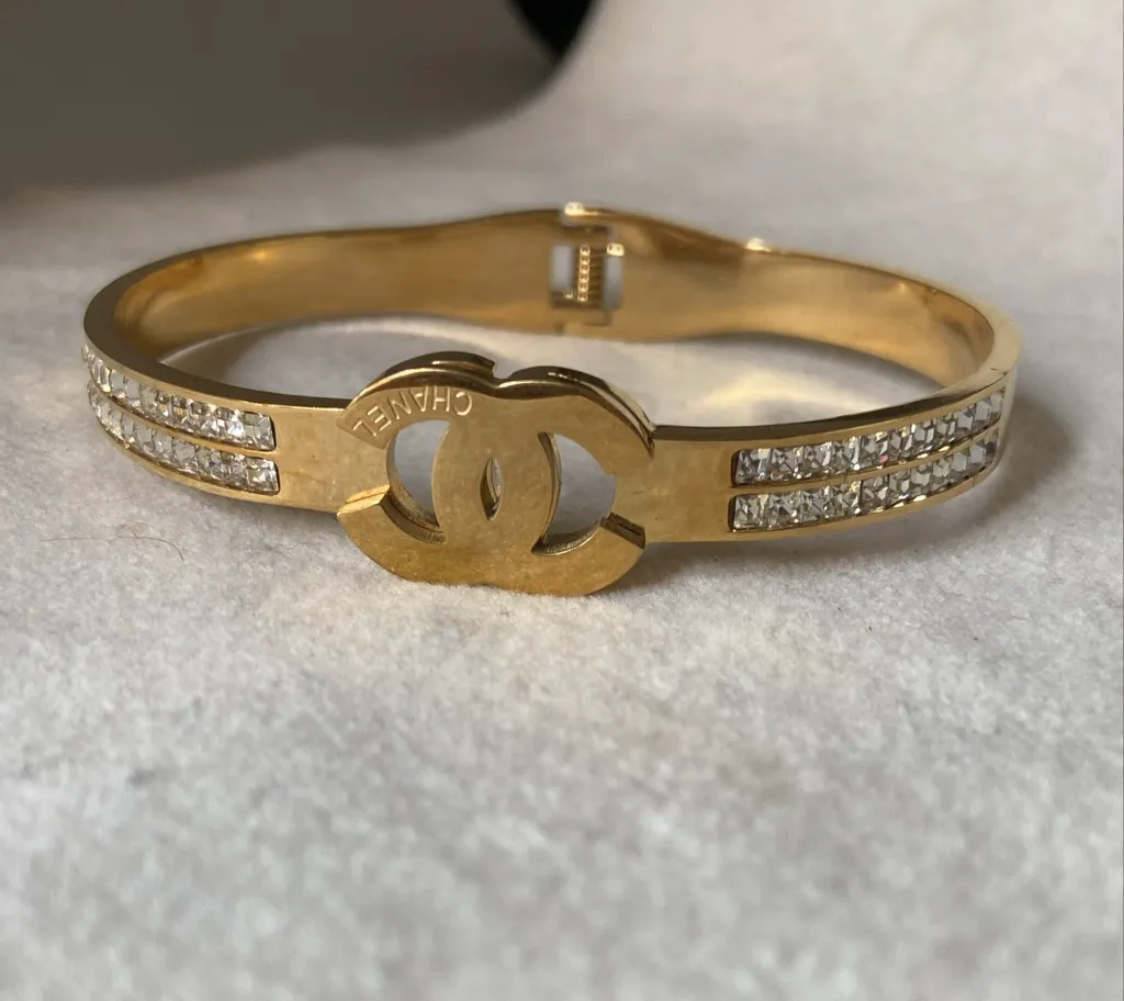 Channel diamond studded bangle bracelet