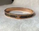 L V Leather textured rose gold bangle bracelet